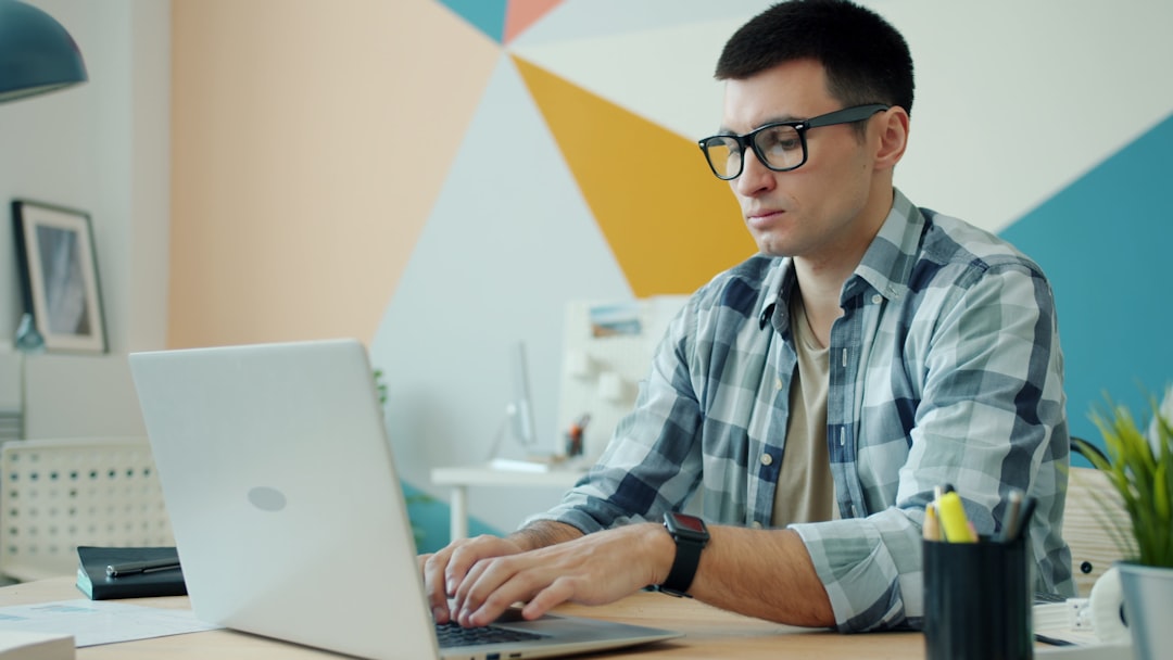 person focused on laptop