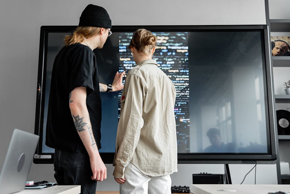 people collaborating with tech