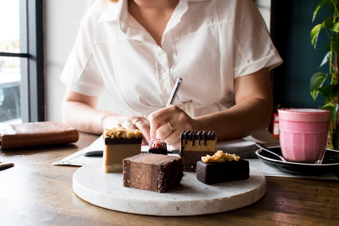 student taking notes tablet