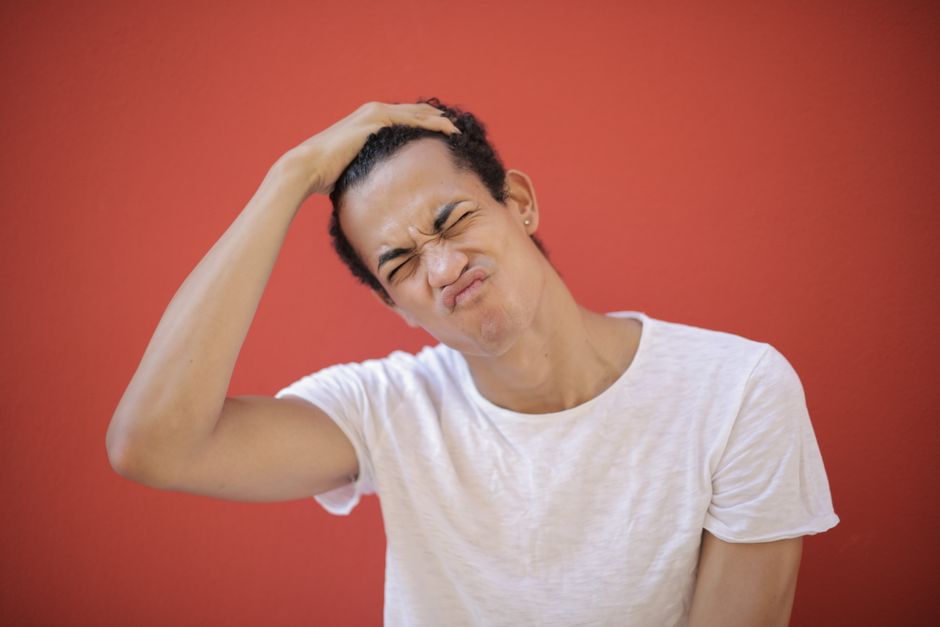 person scratching head person scratching head