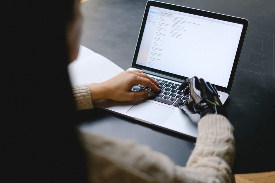 person using AI writing assistant