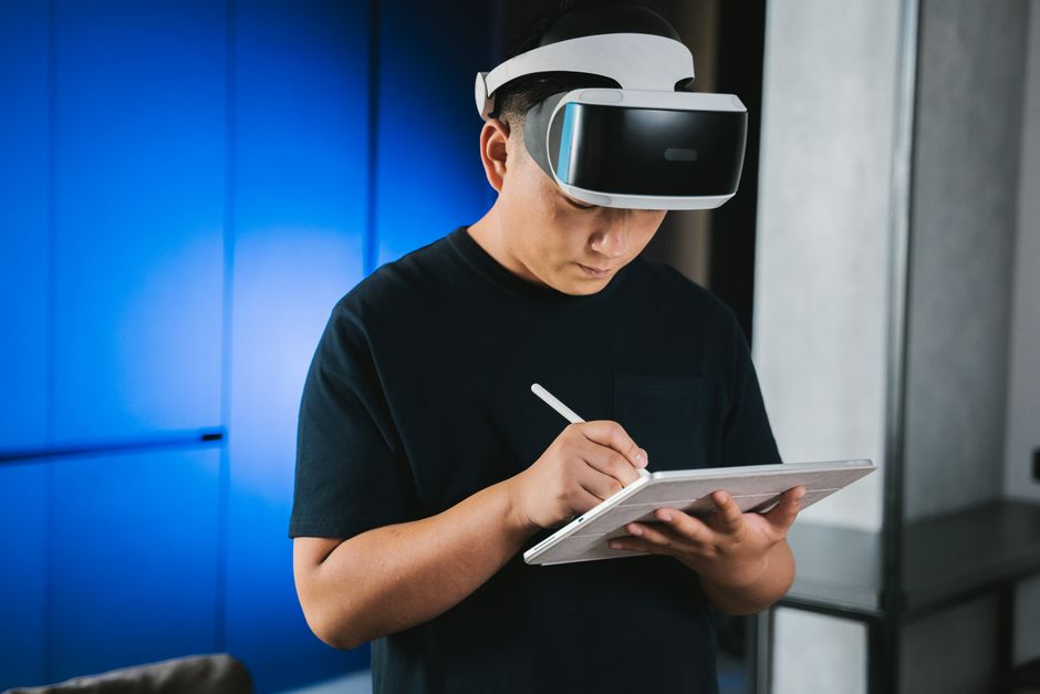 person learning with AI tablet person learning with AI tablet